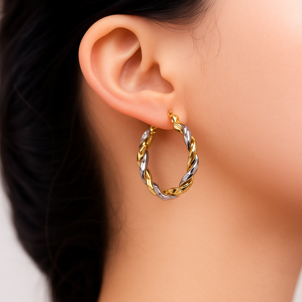 Earrings with twisted tubes in 14K Yellow and White Gold