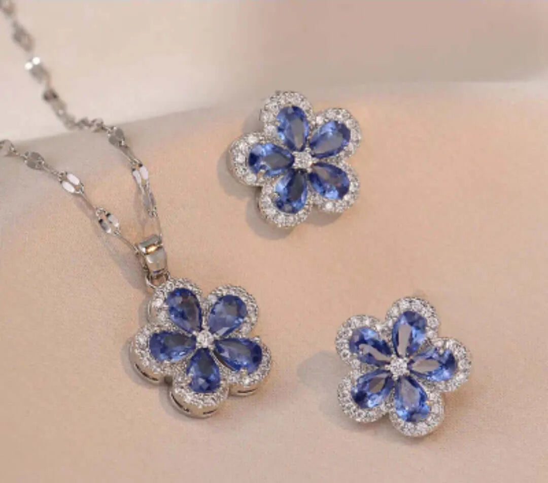 Calenbi Stainless Steel Necklace and Earrings Set with Cubic Zirconia and Blue Flower