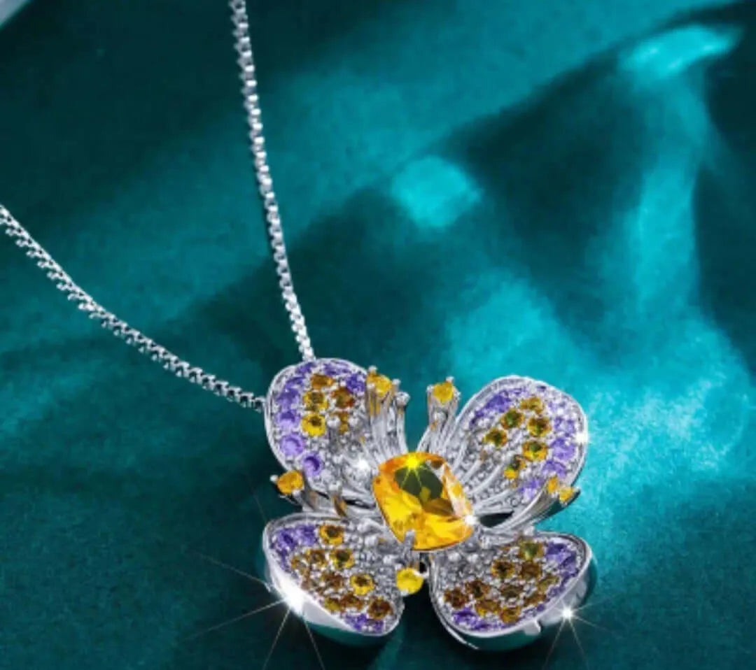 Brave Flower Pendant Necklace with Purple and Yellow Cubic Zirconia by Calenbi
