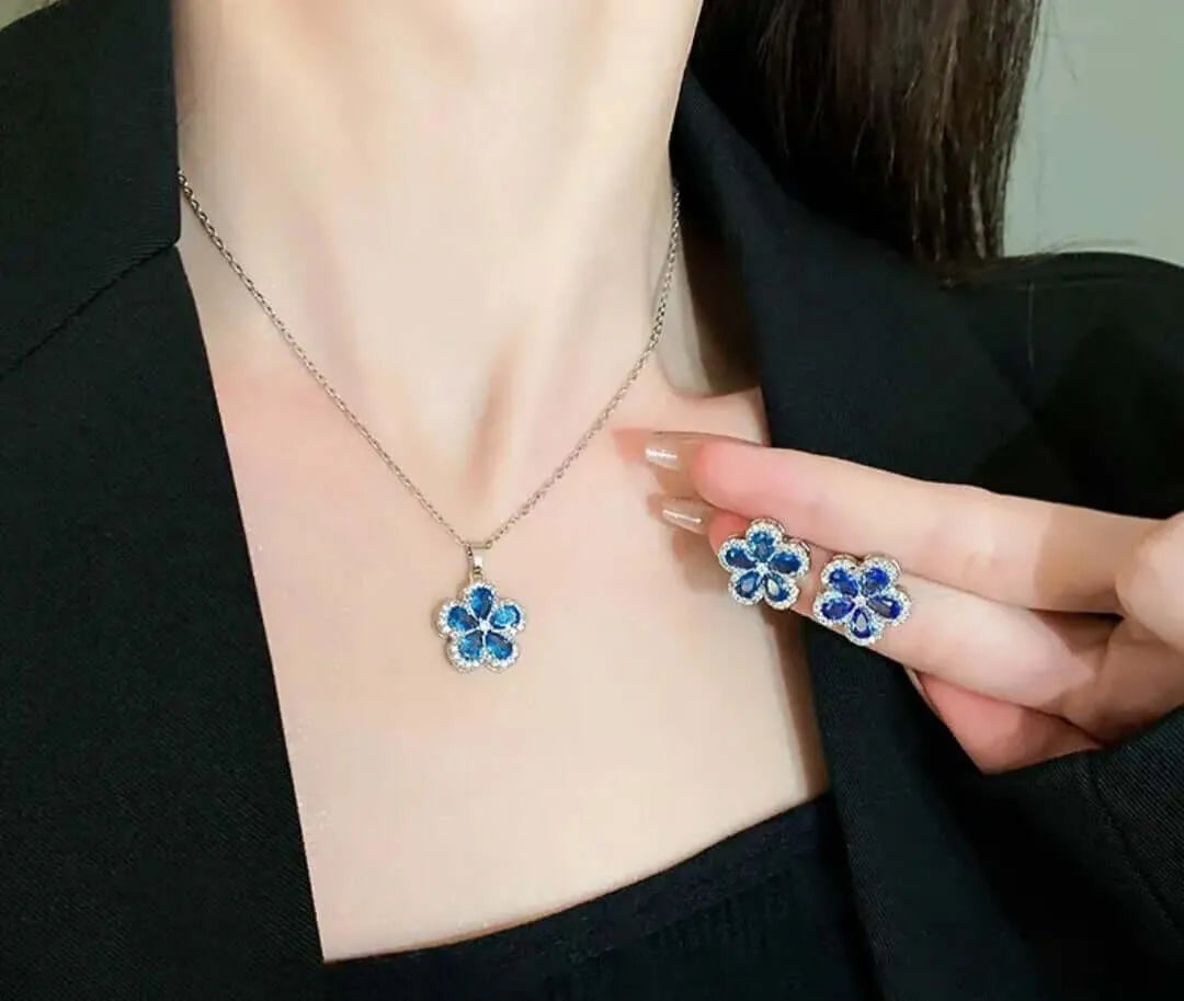 Calenbi Stainless Steel Necklace and Earrings Set with Cubic Zirconia and Blue Flower