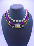 Bohemian Triple Purple Plastic Necklace with Turkish Eye Design by Calenbi